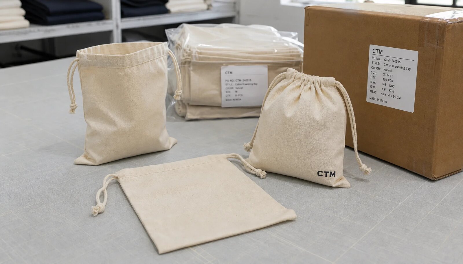 Natural cotton drawstring pouches with sample logo, inner bundle label, and export carton for craft fair packing plan